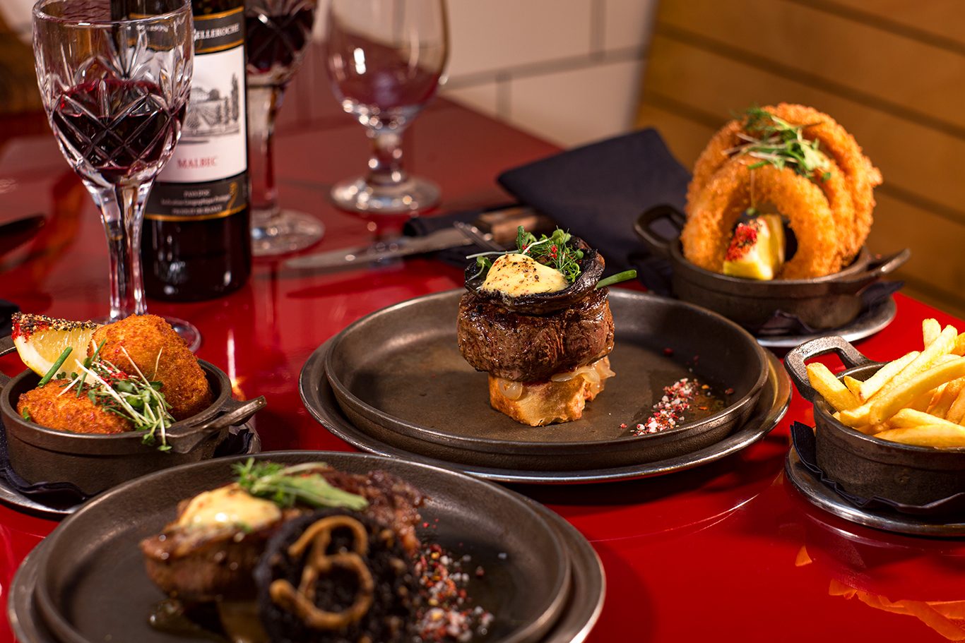 Dry-aged Irish steak with sides served at Boeuf on South William Street, Dublin